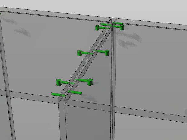 Glaswände mit grünen Halterungen zur Befestigung an der Decke